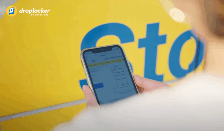 Guest using the Droplocker mobile app to open the bag storage locker and retrieve their items